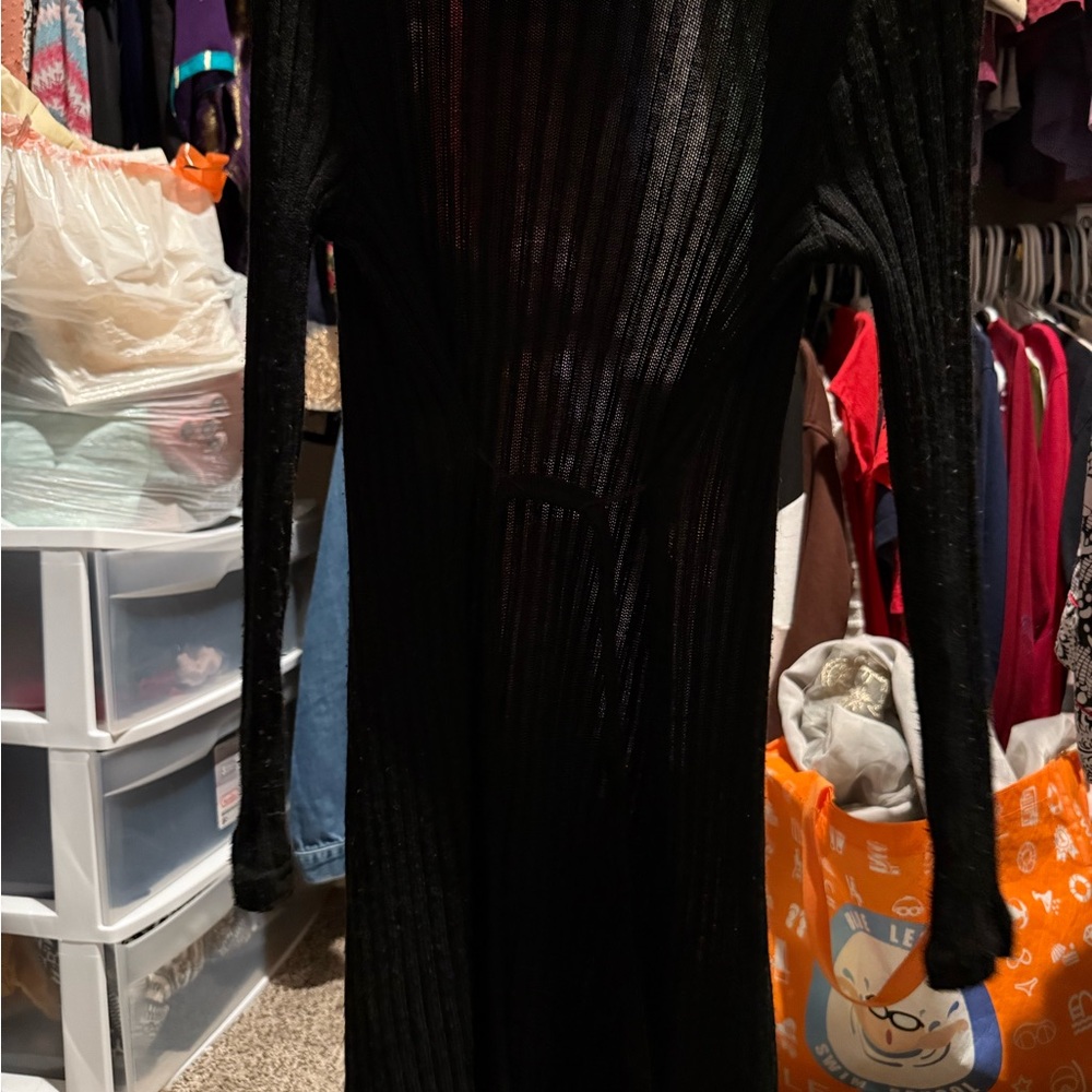 Woman’s cardigan. Worn a few times. In good condition